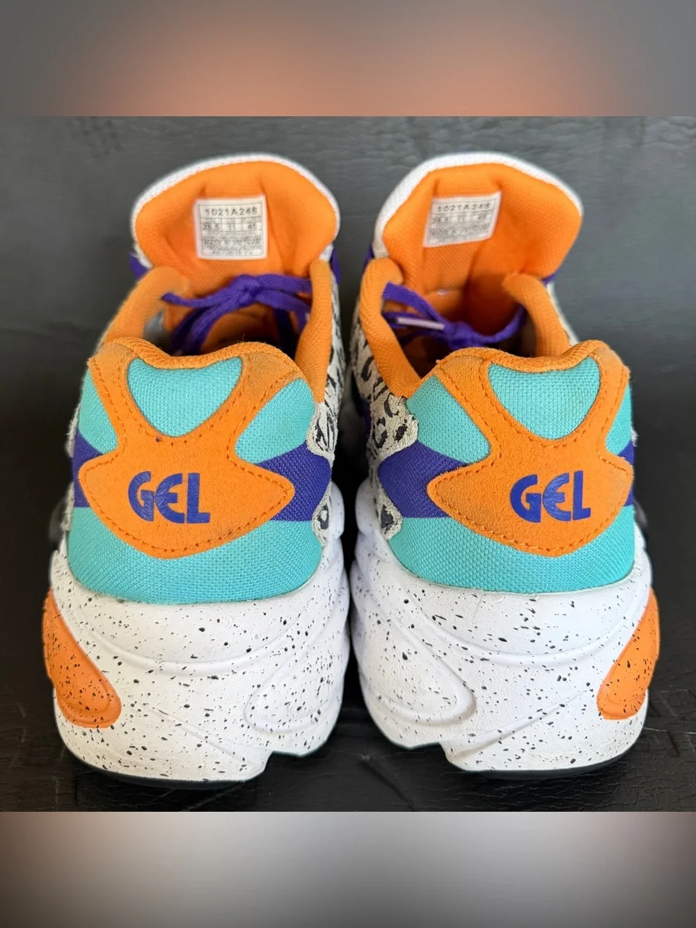 Asics Men’s White Sneakers with Turquoise, Purple & Orange Accents